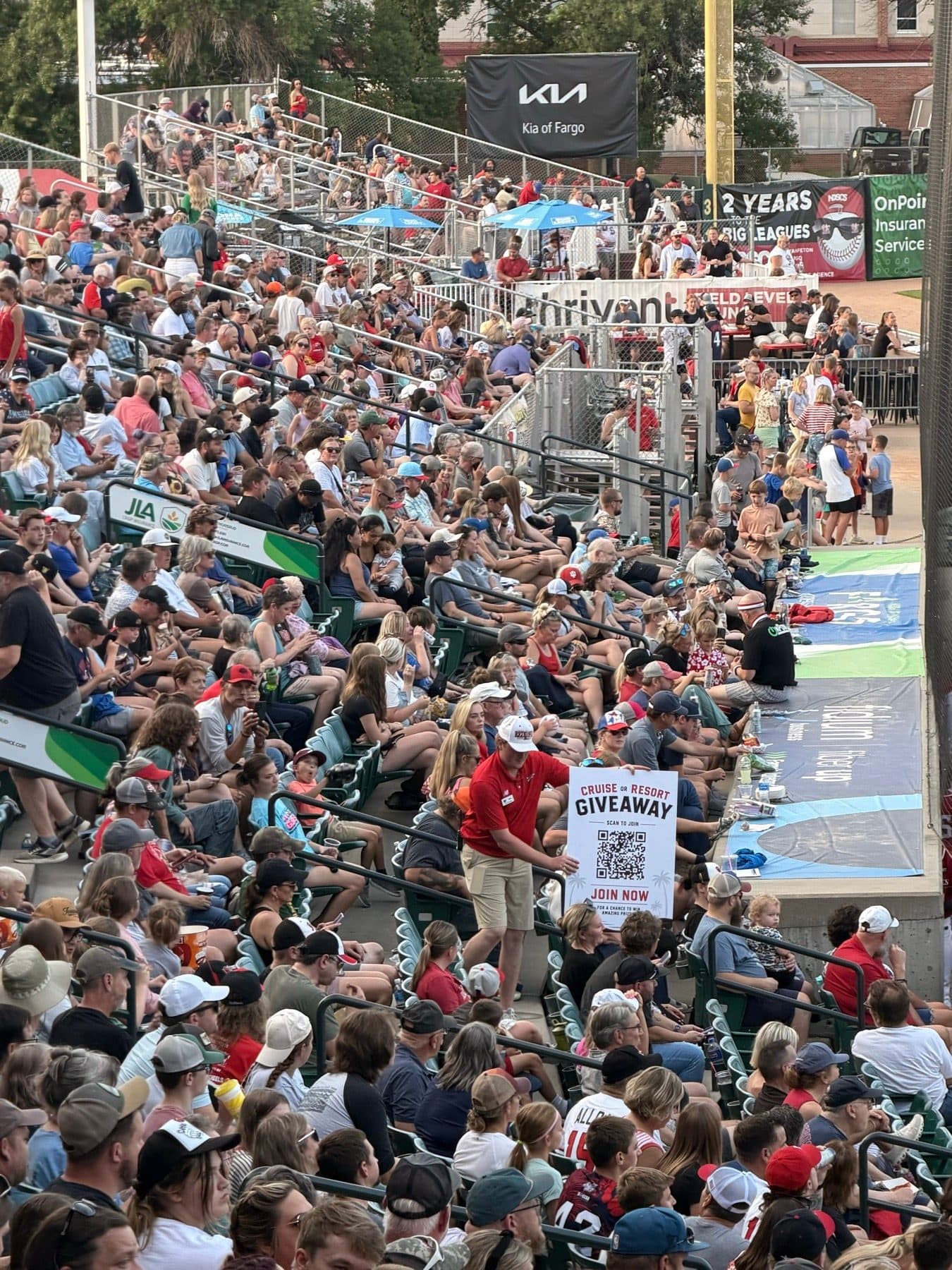 Ballpark crowd joining an AGAVE giveaway