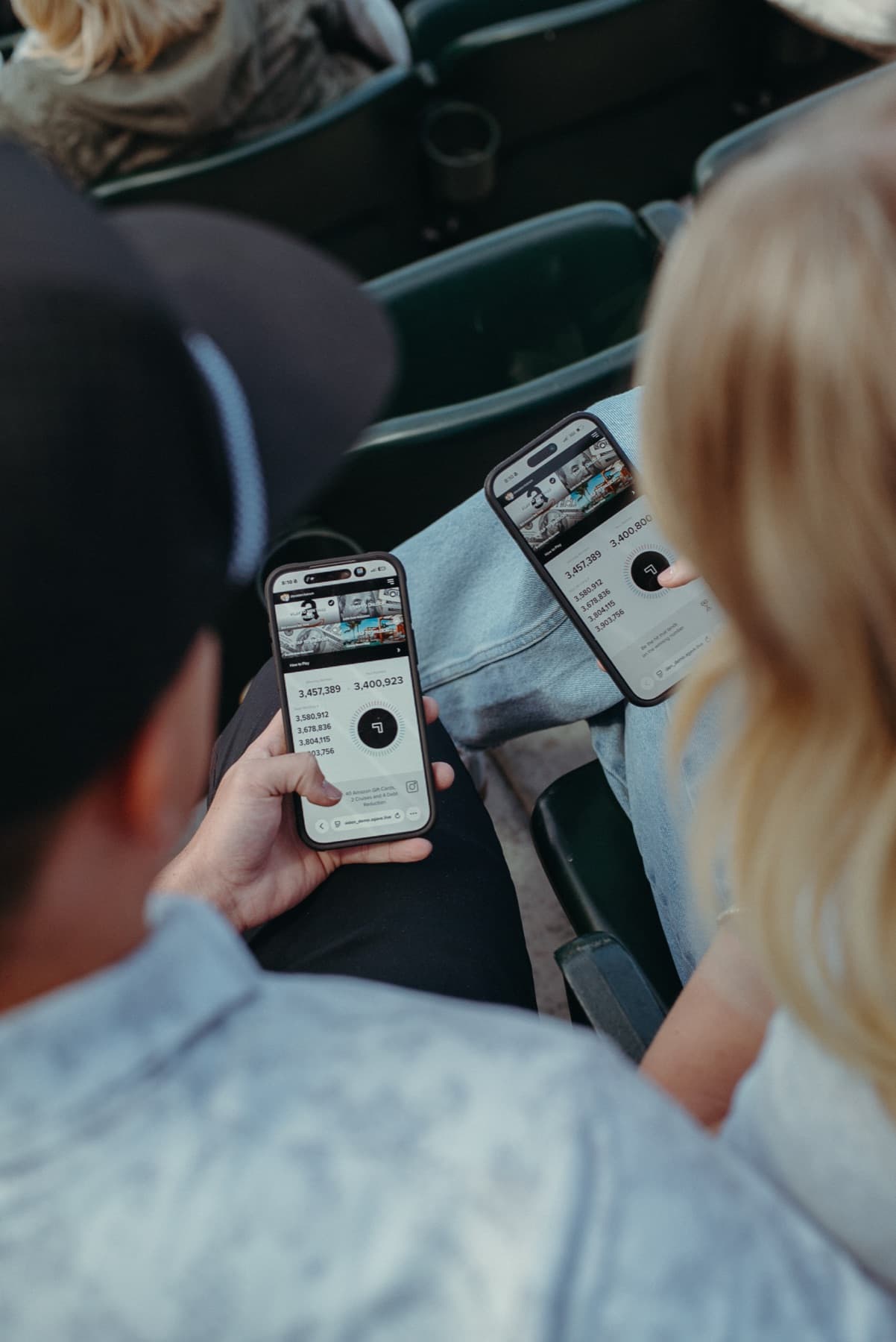 Fans playing the AGAVE game on their phones