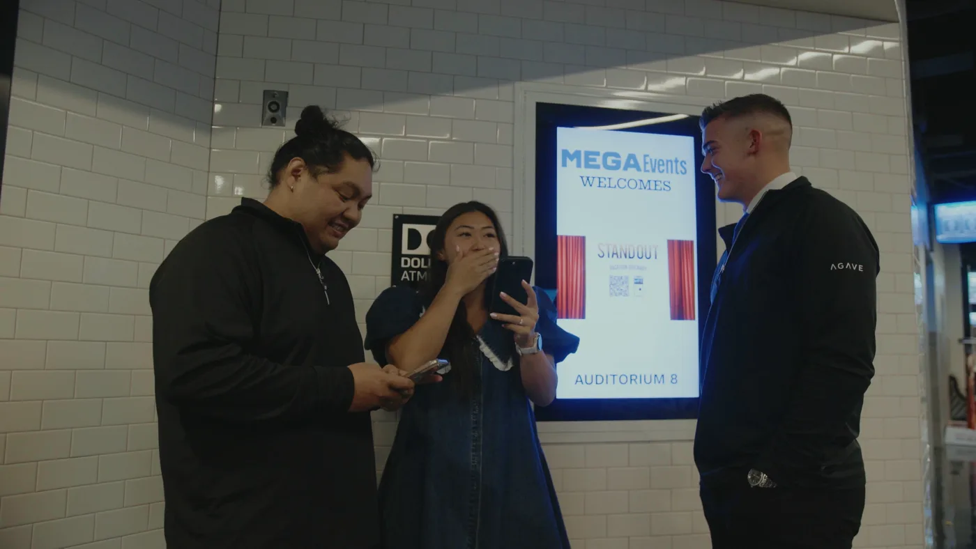 A winner sharing her experience at a movie premiere